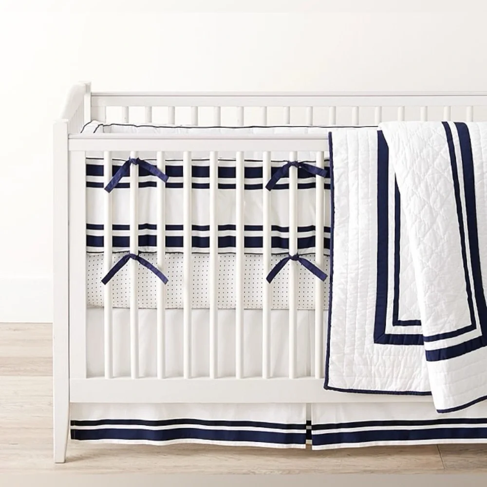POTTERY BARN KIDS white Harper navy trim baby quilt